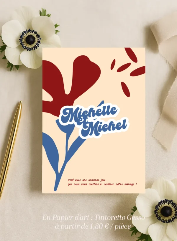 Faire-part de mariage illustré d’une anémone rouge sur fond crème, ambiance poétique et contrastée avec une touche romantique.