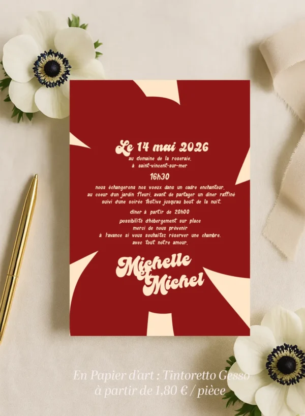 Faire-part de mariage illustré d’une anémone rouge sur fond crème, ambiance poétique et contrastée avec une touche romantique.