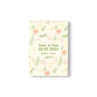 Carte “Notez la Date” de mariage avec motifs floraux en rose, jaune et vert, sur fond crème, texte vert au centre avec la date.