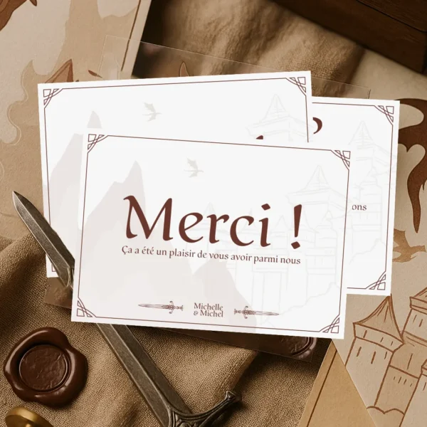 Carte de remerciement mariage fantasy avec "Merci", château, montagnes, dragon et épées croisées en fond.